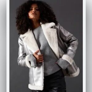 metallic silver aviator jacket with a white faux shearling lining